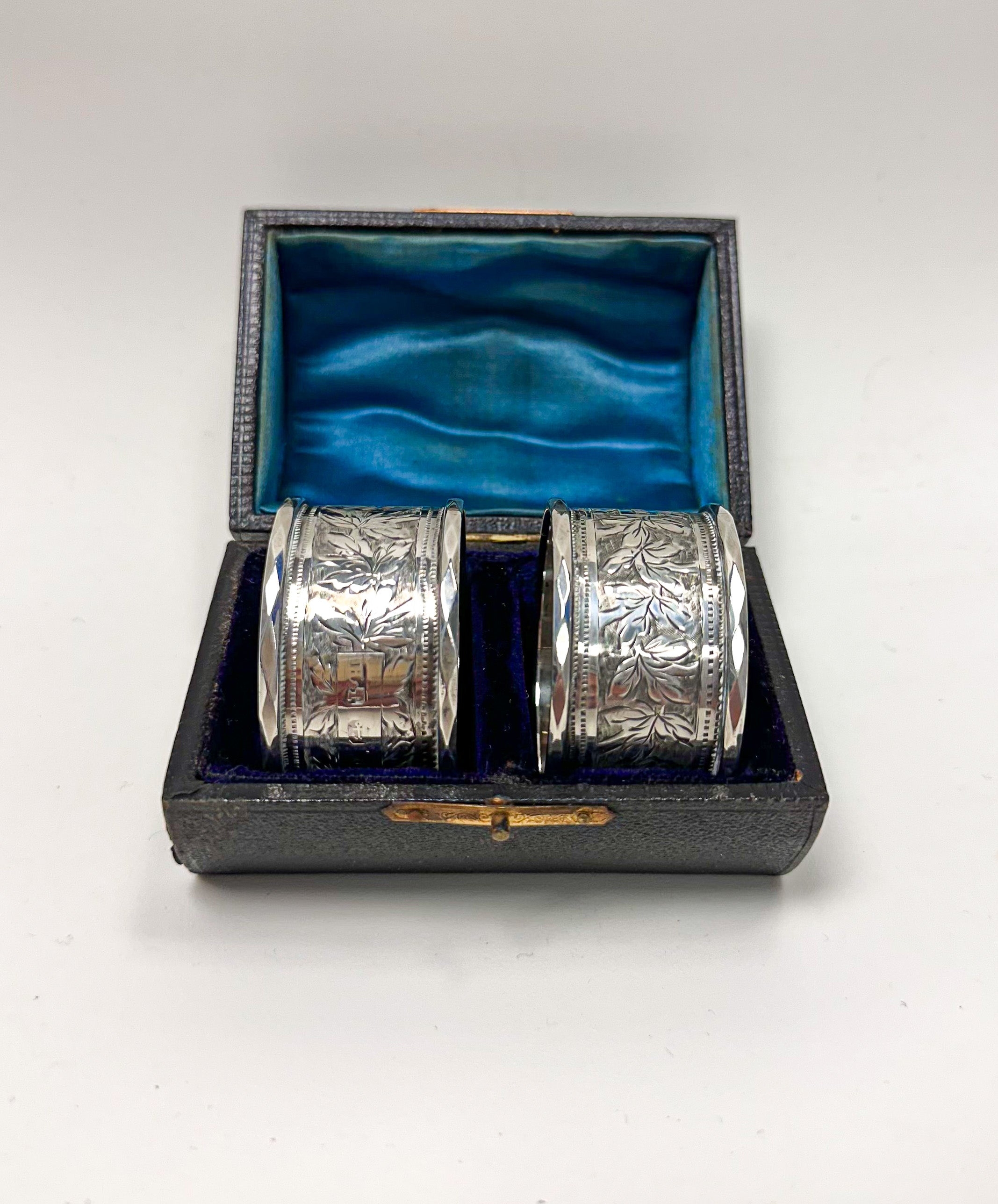 A Pair of Cased Victorian Silver Napkin Rings