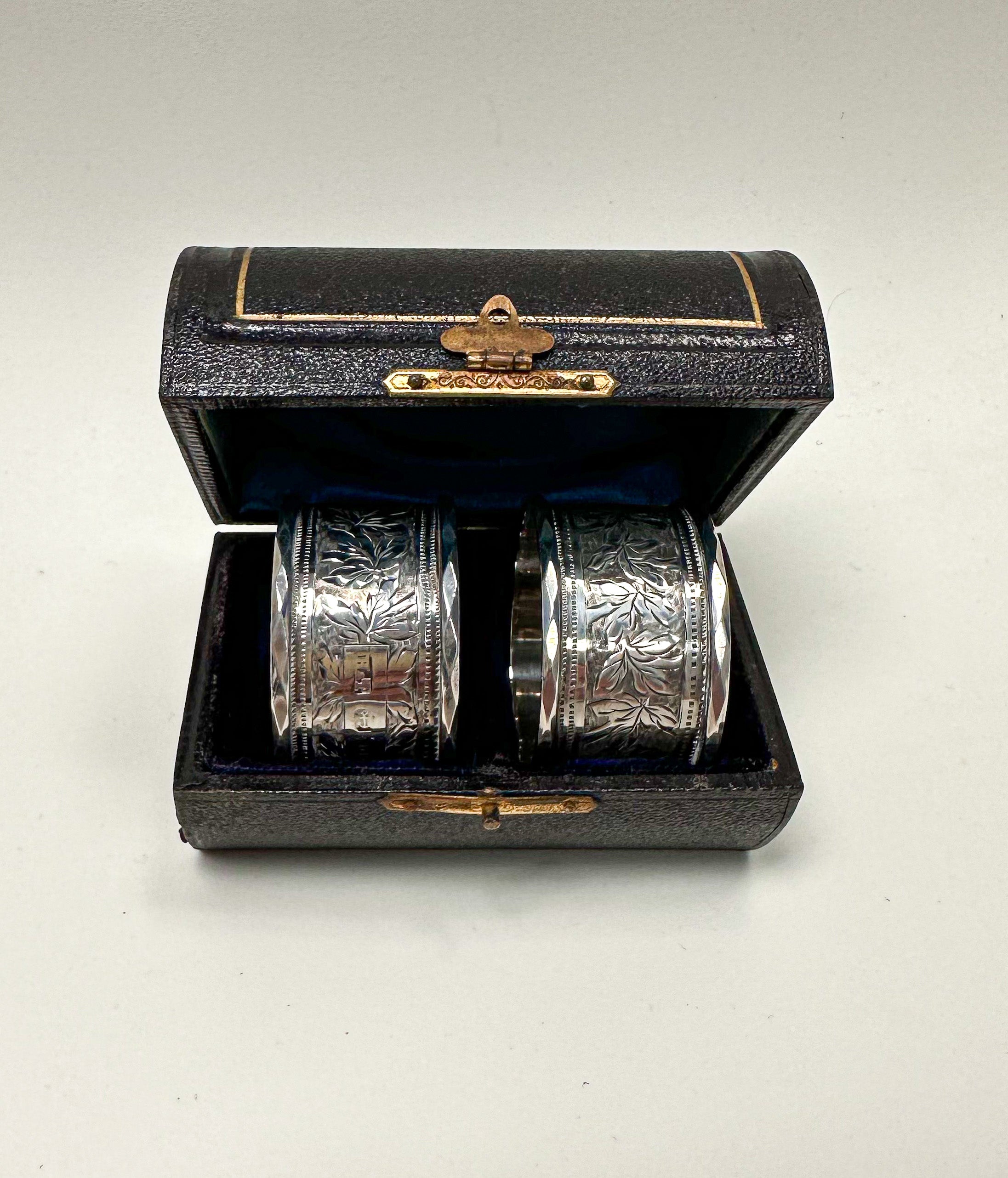 A Pair of Cased Victorian Silver Napkin Rings